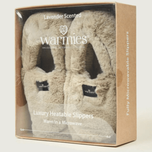 Warmies Luxurious Microwavable Slippers in latte colour displayed in branded packaging