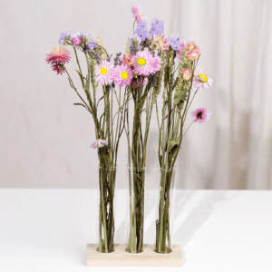 Pretty in Pastel Dried Flower Gift from Bunches showing pastel dried wildflowers with mini vases and stand