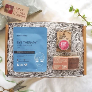The Mini New Mum Gift Box personalised hamper from Don’t Buy Her Flowers showing gift box with self-care treats and sweet snack items