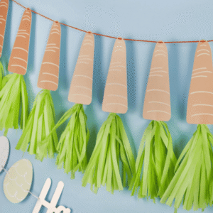 Carrot Tassel Banner from Card Factory hanging as Easter decoration with carrot shapes and green tassels