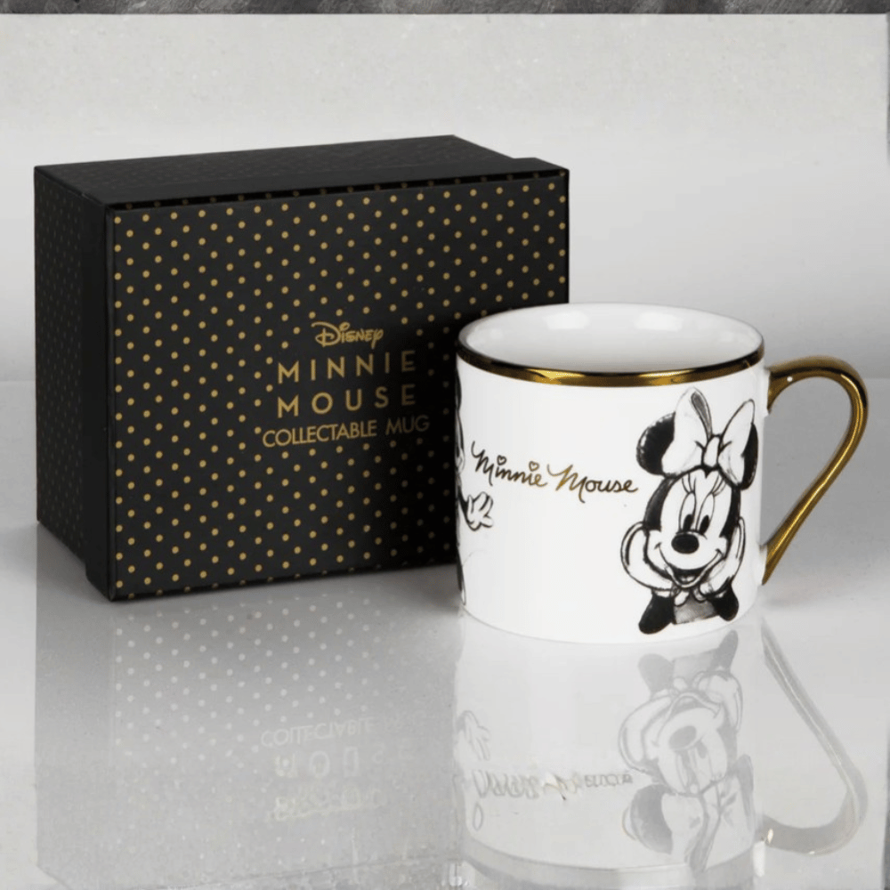 Disney Classic Collectable Mug - Minnie from The Home of Characters showing mug with gold handle and matching gift box