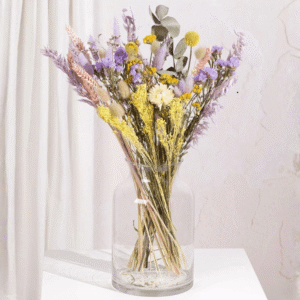 Enchanted Fields Dried Flowers from Bunches showing a mix of soft purple, yellow and natural toned dried blooms