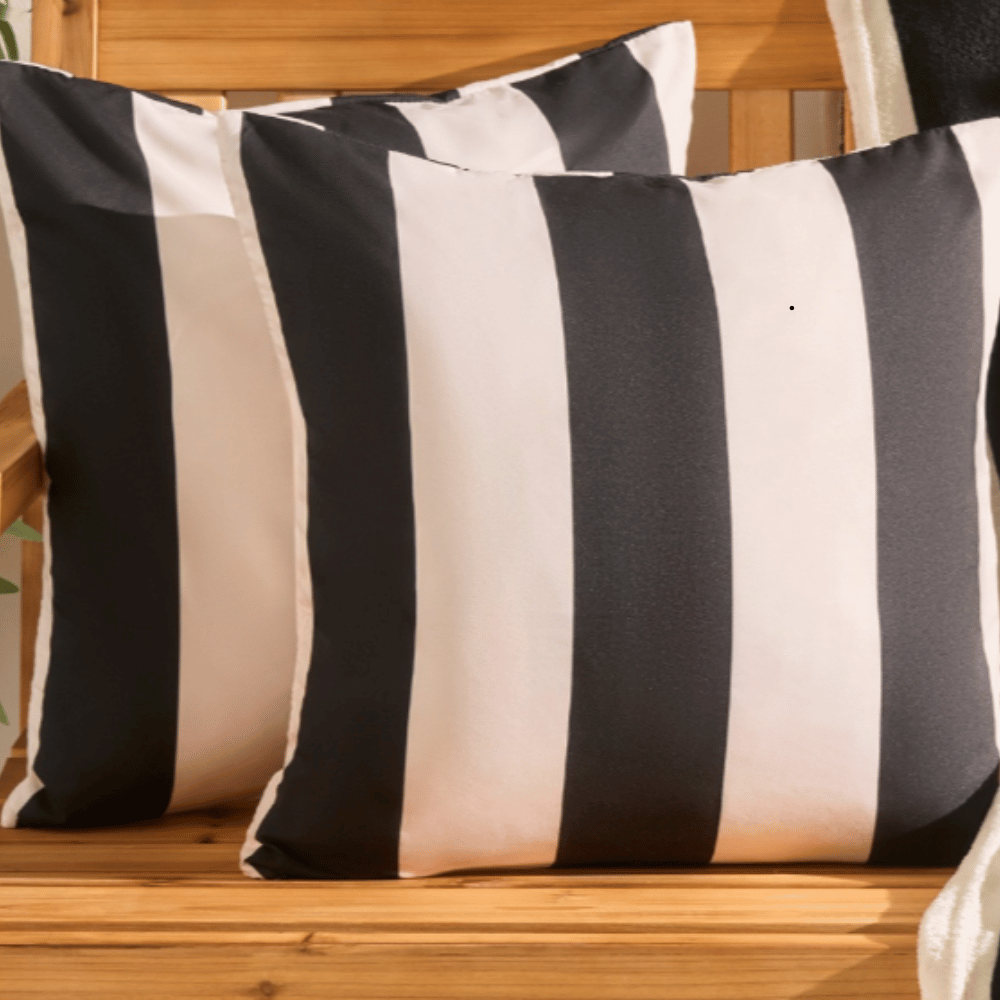 Black stripe indoor outdoor cushion covers from OHS featuring bold vertical stripe pattern