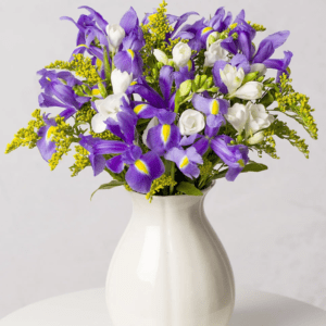 Iris and Freesia bouquet from Bunches showing purple iris, white freesia and yellow accent flowers