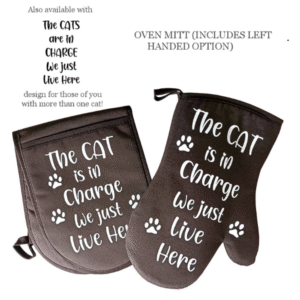 The Cat Is in Charge We Just Live Here Oven Glove or Mitt from Cats in Charge showing chocolate coloured cotton design with cat slogan