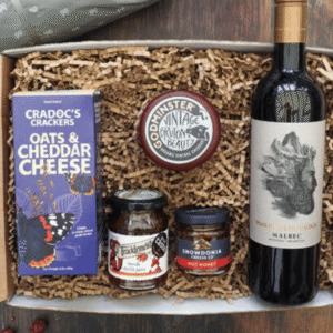 The Cheese and Wine Gift Box from DBHF showing a cheese and wine hamper with savoury treats