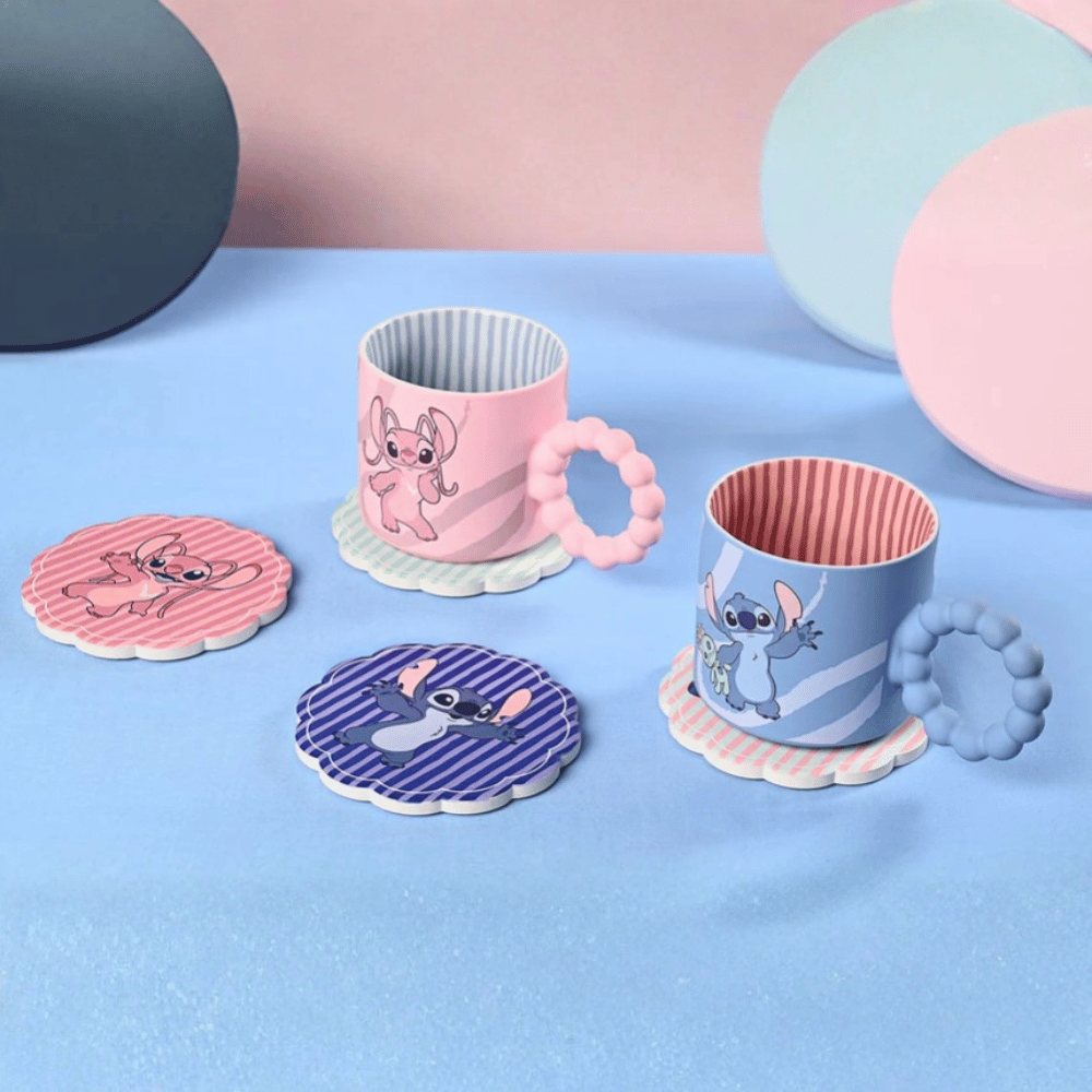 Disney Stitch ceramic mugs with matching character coasters showing blue and pink designs