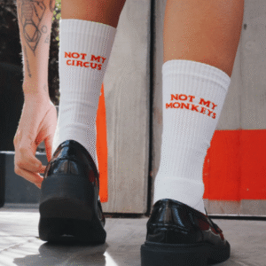 Not My Circus Socks from Broken Society showing tattoo-inspired design and ribbed sock style