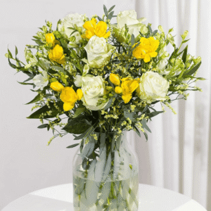 Spring Roses and Freesias from Bunches showing white roses and yellow freesias with green foliage