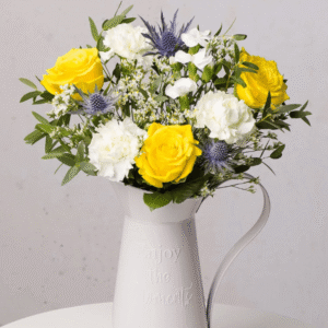Sweet Sunshine Letterbox from Bunches showing yellow roses, cream carnations and blue thistles in a bright bouquet
