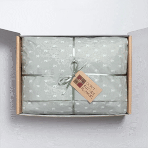 Create a Gift Box from Don’t Buy Her Flowers showing wrapped gift box with ribbon and branded tag