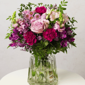 Elderberry Elegance from Bunches showing pink and purple flowers with fresh greenery