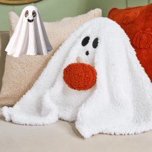 Gilbert The Ghost Cushion from OHS showing a cream friendly ghost-shaped design with an adorable expression