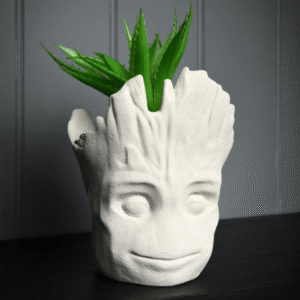 Marvel Groot Planter With Faux Plant from The Home of Characters showing the Groot character planter with faux plant leaves