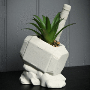 Marvel Thor Hammer Planter With Faux Plant from THOC showing Thor's hammer planter with faux plant