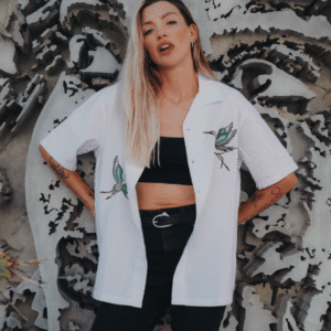 Cranes Havana Shirt from Broken Society in white being worn open, showing the crane artwork on the front