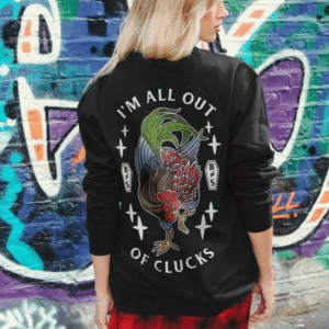 Model wearing the black I'm All Out Of Clucks sweatshirt from Broken Society showing the tattoo-style chicken back design