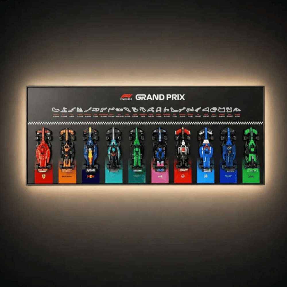 BrickZoneHub wall-mounted display frame showing 10 LEGO® Speed Champions F1 cars with a Grand Prix themed backdrop