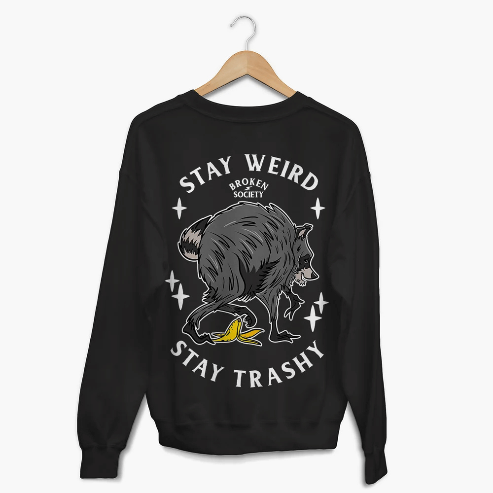 Stay Weird Stay Trashy Sweatshirt from Broken Society showing the raccoon and banana design on a black sweatshirt