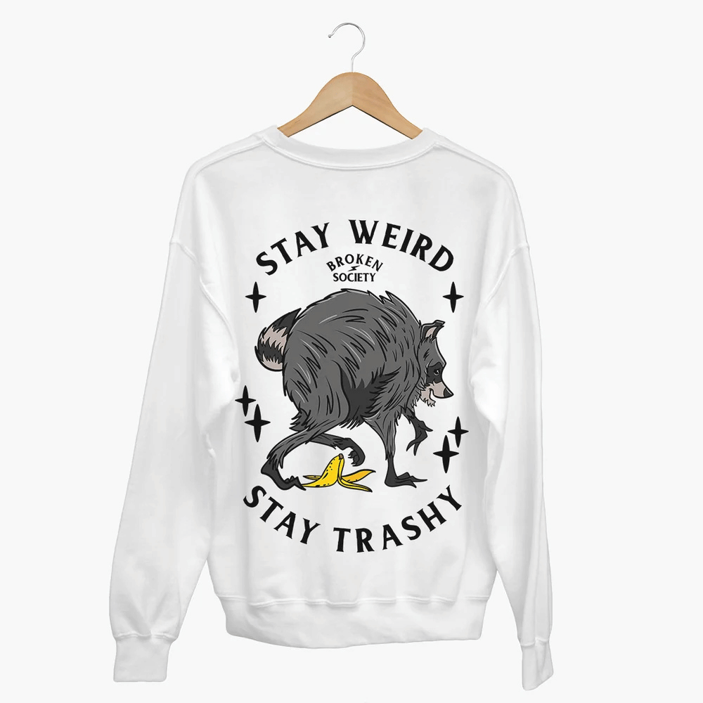 Stay Weird Stay Trashy Sweatshirt from Broken Society showing the raccoon and banana design on a white sweatshirt